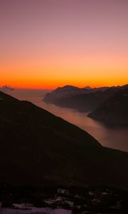 Preview wallpaper mountains, fog, sunset, lake, italy