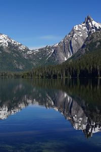 Preview wallpaper mountains, forest, trees, lake, reflection, nature, landscape