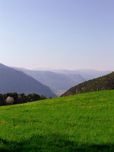 Preview wallpaper mountains, glade, grass, fog