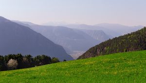 Preview wallpaper mountains, glade, grass, fog