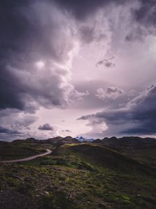 Preview wallpaper mountains, grass, clouds, overcast, twilight, cloudy