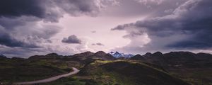 Preview wallpaper mountains, grass, clouds, overcast, twilight, cloudy