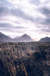 Preview wallpaper mountains, grass, landscape, clouds, fog, hilly