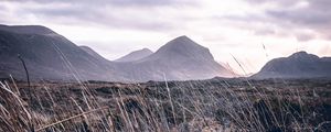 Preview wallpaper mountains, grass, landscape, clouds, fog, hilly