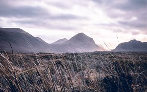 Preview wallpaper mountains, grass, landscape, clouds, fog, hilly