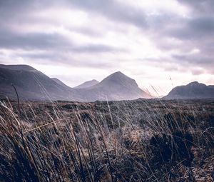 Preview wallpaper mountains, grass, landscape, clouds, fog, hilly