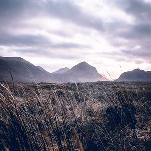 Preview wallpaper mountains, grass, landscape, clouds, fog, hilly