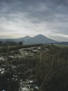 Preview wallpaper mountains, grass, path, distance