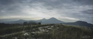 Preview wallpaper mountains, grass, path, distance