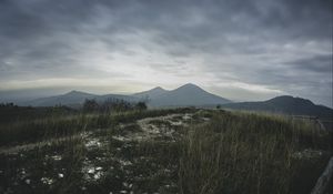 Preview wallpaper mountains, grass, path, distance