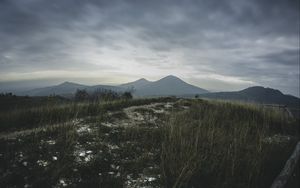 Preview wallpaper mountains, grass, path, distance