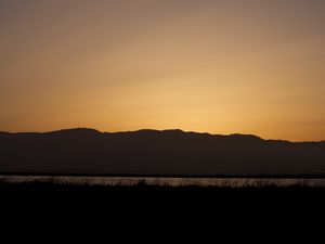 Preview wallpaper mountains, grass, river, twilight, silhouettes