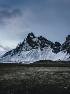 Preview wallpaper mountains, grass, snow, evening