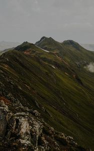 Preview wallpaper mountains, grass, stones, top