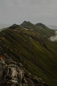 Preview wallpaper mountains, grass, stones, top