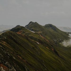 Preview wallpaper mountains, grass, stones, top