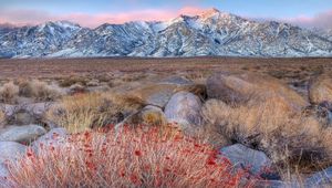 Preview wallpaper mountains, grass, stones, evening, autumn, snow