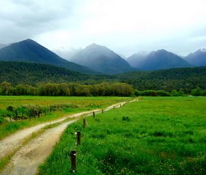 Preview wallpaper mountains, grass, summer, fence