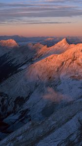 Preview wallpaper mountains, greatness, height, tops, over clouds, morning, dawn, shadow