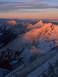 Preview wallpaper mountains, greatness, height, tops, over clouds, morning, dawn, shadow