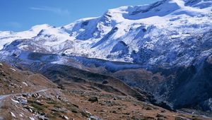 Preview wallpaper mountains, greatness, stones, snow, clouds, sky, track