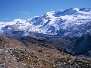 Preview wallpaper mountains, greatness, stones, snow, clouds, sky, track