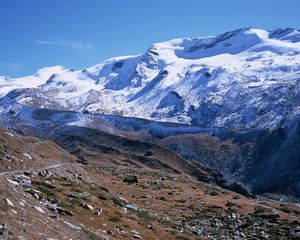 Preview wallpaper mountains, greatness, stones, snow, clouds, sky, track