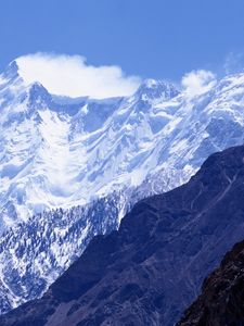 Preview wallpaper mountains, greatness, wall, snow, tops, shadow, clouds, sky