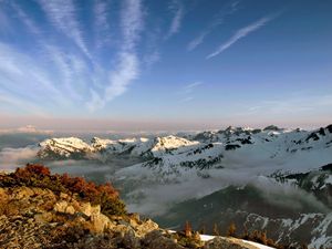 Preview wallpaper mountains, height, sky, clouds, stones, strips, freshness, tops, snow-covered, solarly