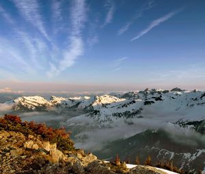 Preview wallpaper mountains, height, sky, clouds, stones, strips, freshness, tops, snow-covered, solarly