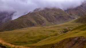 Preview wallpaper mountains, hills, building, fog