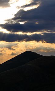 Preview wallpaper mountains, hills, clouds, rays, sun, dark