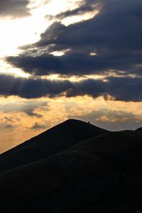 Preview wallpaper mountains, hills, clouds, rays, sun, dark