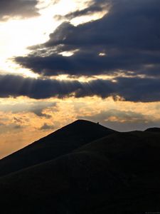 Preview wallpaper mountains, hills, clouds, rays, sun, dark