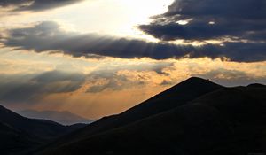 Preview wallpaper mountains, hills, clouds, rays, sun, dark