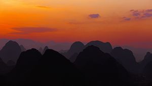 Preview wallpaper mountains, hills, distance, sunset, sky