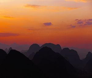 Preview wallpaper mountains, hills, distance, sunset, sky