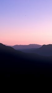 Preview wallpaper mountains, hills, distance, sunset, silhouette, sky