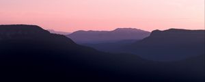 Preview wallpaper mountains, hills, distance, sunset, silhouette, sky