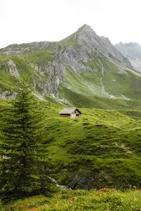 Preview wallpaper mountains, hills, house, nature, greenery