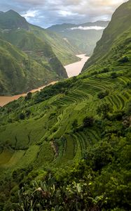 Preview wallpaper mountains, hills, river, grass, bushes, landscape