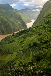 Preview wallpaper mountains, hills, river, grass, bushes, landscape