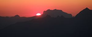 Preview wallpaper mountains, hills, silhouettes, sunset, sun, dark
