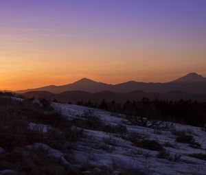 Preview wallpaper mountains, hills, slope, snow, sunset