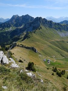 Preview wallpaper mountains, hills, stones, slopes, sky, nature