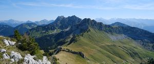 Preview wallpaper mountains, hills, stones, slopes, sky, nature