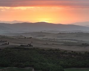 Preview wallpaper mountains, hills, sunset, evening, fog, tuscany, italy