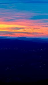 Preview wallpaper mountains, hills, sunset, sky, distance