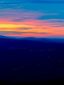 Preview wallpaper mountains, hills, sunset, sky, distance