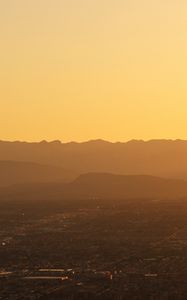 Preview wallpaper mountains, hills, town, sunrise